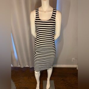 Tight black and white striped maxi dress with cross back